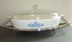 I prefer using a flat covered dish like my favourite Corning Ware. Makes it very easy to put away after it cools too.